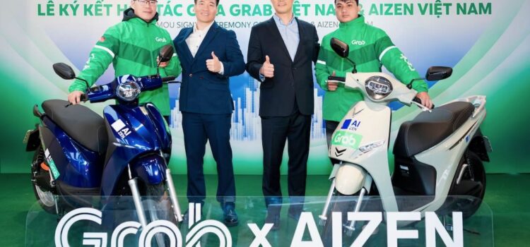 Grab Việt Nam hợp tác AIZEN triển khai giải pháp thuê xe máy điện cho tài xế Grab
